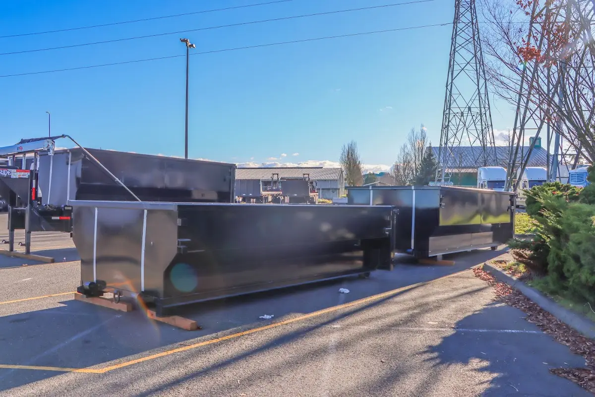Roll-off dumpster ready for waste disposal at job site for 6 Yard Dumpster Rental in Walton
